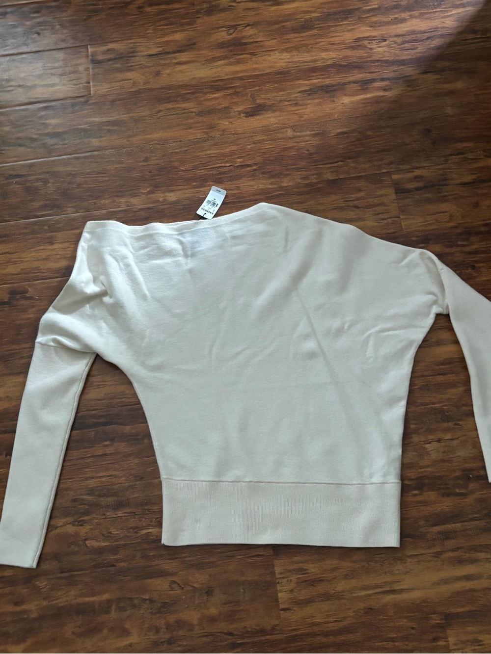 EXPRESS NWT asymmetrical top, super soft. Wear off 1 shoulder, boat neck.
